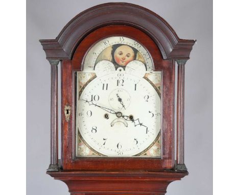 An early 19th century mahogany longcase clock with eight day movement striking on a bell, the 12-inch painted breakarch dial 