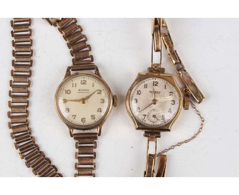 A Buren Grand Prix 9ct gold circular cased lady's wristwatch, Birmingham 1955, on a 9ct gold link bracelet with 'Bonklip' cla