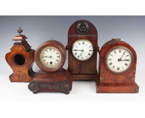 A 19th century mahogany mantel timepiece with French eight day movement, the domed case on turned feet, height 31cm, together