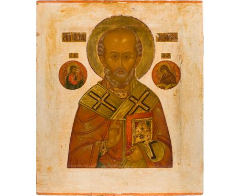 AN ICON SHOWING ST. NICHOLAS OF MYRA Russian, late 19th century Tempera on wood panel with kovcheg. The halo made of gold. Th