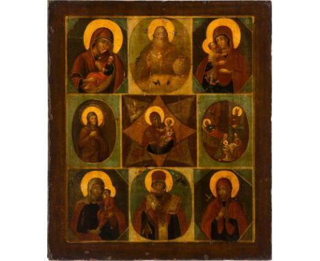 A MULTI-PARTITE ICON SHOWING GOD FATHER, IMAGES OF THE MOTHER OF GOD AND SAINTS Russian, circa 1830 Oil on wood panel. The ha