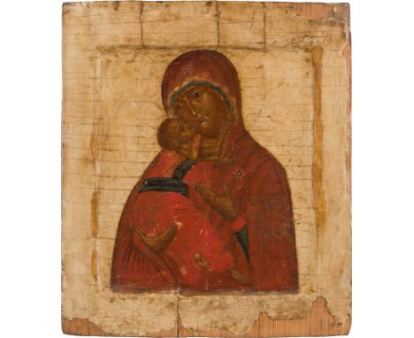 AN ICON SHOWING THE VLADIMIRSKAYA MOTHER OF GOD Russian, 18th century Tempera on wood panel with kovcheg. The background and 