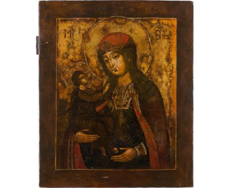 AN ICON SHOWING THE MOTHER OF GOD Russian, 18th century Tempera on wood panel. Executed on a gold ground. Restorations. 34 x 