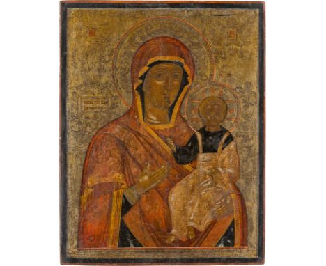 A LARGE ICON SHOWING THE SMOLENSKAYA MOTHER OF GOD Russian, late 18th century Tempera on wood panel. The background made of s