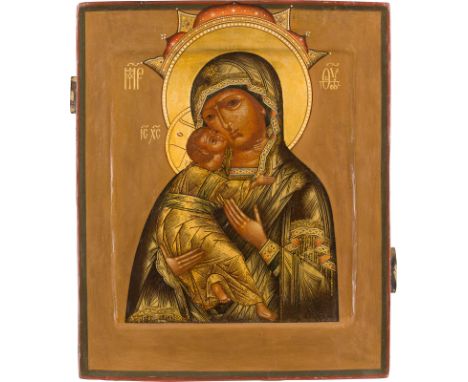 AN ICON SHOWING THE VLADIMIRSKAYA MOTHER OF GOD Russian, 18th century Tempera on wood panel with double kovcheg. The haloes m
