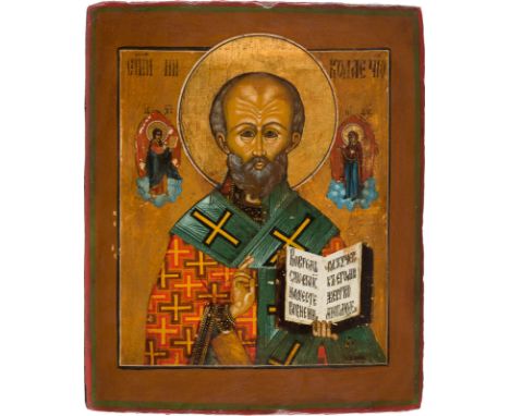 AN ICON SHOWING ST. NICHOLAS OF MYRA Russian, 19th century Tempera on wood panel with kovcheg. The haloes made of gold. Parti