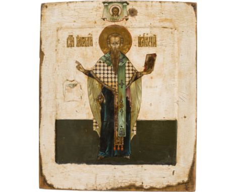 AN ICON SHOWING ST. BASIL THE GREAT Russian, 19th century Tempera on wood panel with kovcheg. The halo made of gold. The back