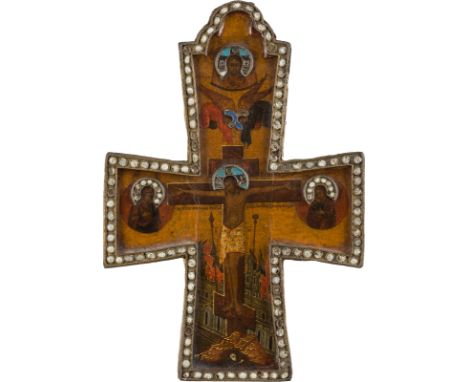 A CRUCIFIX Russian, circa 1800 Tempera on wood panel with kovcheg. The border with brass and enamel mount. Enamel minimally c