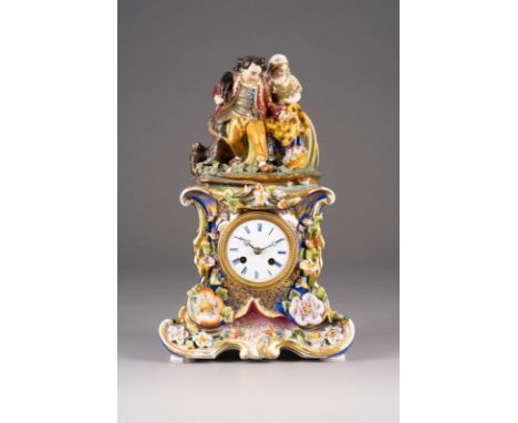 A PORCELAIN ROCOCO REVIVIAL CLOCK Russian, probably Gardner Porcelain Factory, mid 19th century The shaped body decorated in 