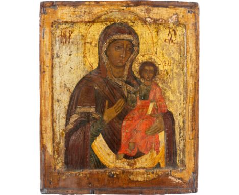AN ICON SHOWING THE SMOLENSKAYA MOTHER OF GOD Russian, 18th century Tempera on wood panel with double kovcheg. Losses, areas 