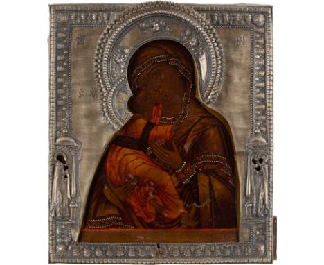 AN ICON SHOWING THE VLADIMIRSKAYA MOTHER OF GOD WITH RIZA Russian, late 18th century (icon), Russian, circa 1800 (riza) Tempe