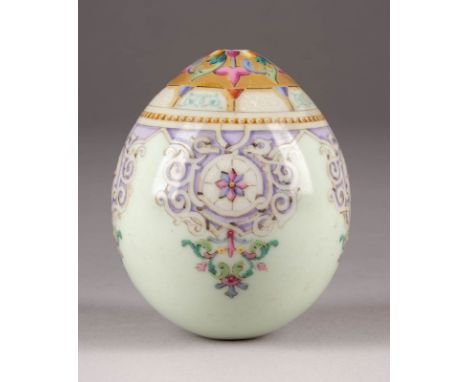 A PORCELAIN EASTER EGG Russian, St. Petersburg, Imperial Porcelain Manufactory, circa 1875 The ovoid body decorated with stra