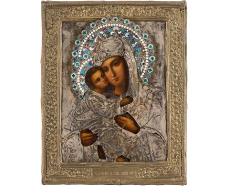 A SMALL ICON SHOWING THE VLADIMIRSKAYA MOTHER OF GOD WITH A CLOISONNÉ ENAMEL OKLAD Russian, circa 1875 (icon), Russian, late 