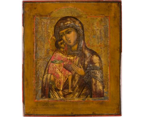 AN ICON SHOWING THE FEODOROVSKAYA MOTHER OF GOD Russian, 19th century Tempera on wood panel with kovcheg. Executed on a gold 