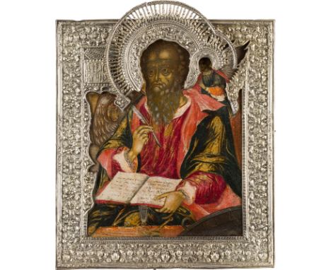 A FINE ICON SHOWING ST. JOHN THE EVANGELIST WITH A SILVER-GILT BASMA Russian, Moscow, Circle of the Kremlin Workshops, circa 