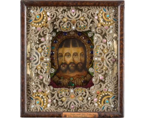 A SMALL ICON SHOWING THE TRINITY OF GOD WITHIN A KYOT Russian, 19th/20th century Oil on wood panel. 26.6 x 23.2 cm (with glaz