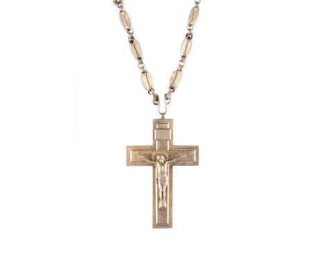 A SILVER-GILT PENDANT CROSS Russian, probably Moscow, 1908-1917 The pendant cross decorated with the crucified Christ. The re