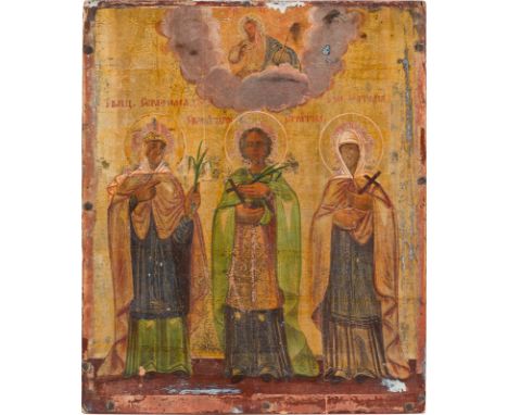 AN ICON SHOWING THREE SAINTS Russian, 19th century Oil on wood panel. The background made of silver, covered by a golden lacq