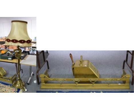 A brass fender; a purdonium; and a standard lamp (3)