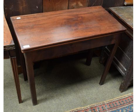 A George III mahogany fold over card table 