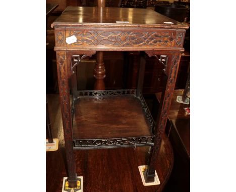 A 19th century square mahogany occasional table, decorated with blind fretwork, the shelf stretcher with pierced fretwork gal