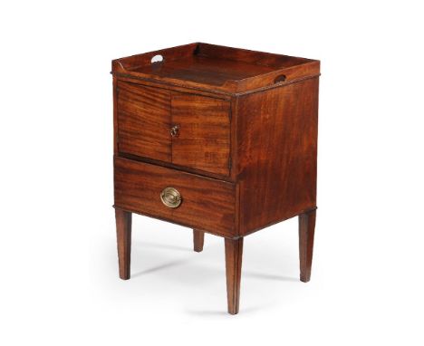 A George lll mahogany night commode, circa 1800, the rectangular top with three quarter gallery incorporating pierced side ca