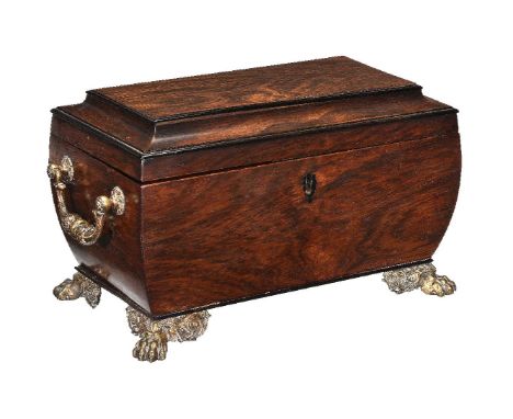 ϒ A George IV ebony banded and rosewood tea caddy, circa 1825, of rectangular section, the hinged cover with cavetto edging a