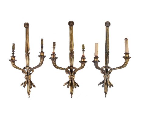 A set of three gilt metal twin light wall appliques in Louis XVI style, first half 20th century, the cornucopia form branches