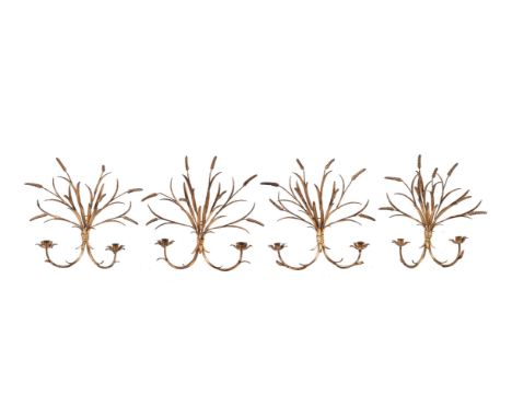 A set of four Italian wrought and gilt metal twin light wall appliques, late 20th century, the foliate sconces on scrolled ar