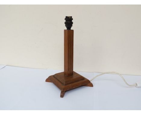 An Art Deco oak table lamp