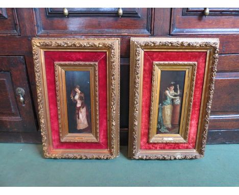 J. HOLTER (XIX): A pair of oils on panel depicting ladies in evening dress. Signed. 29cm x 11cm. Gilt and red velvet frames.