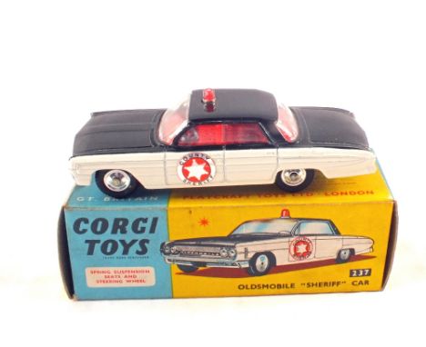 A boxed Corgi Toys 237 Oldsmobile 'Sheriff' car (good condition)