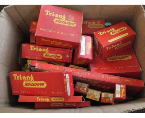 Boxed Triang railways track and accessories including battery boxes, ticket office etc