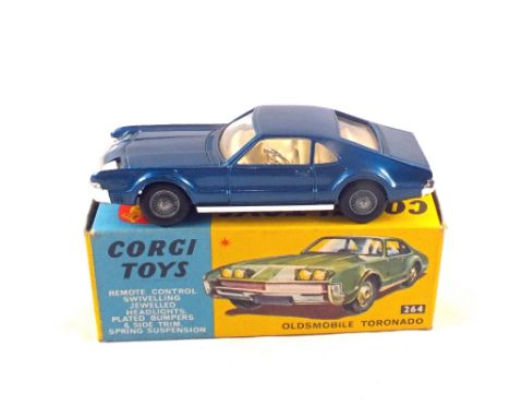 A boxed Corgi Toys 264 Oldsmobile Toronado, in blue with white interior