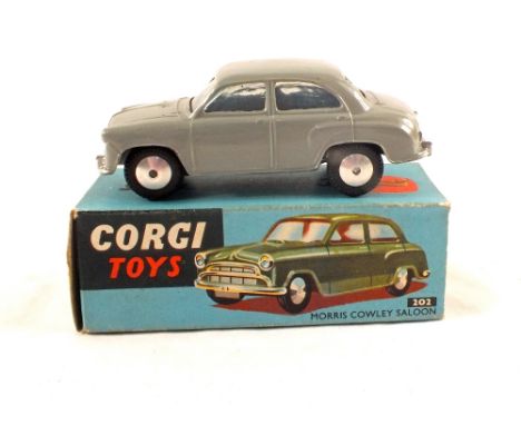 A boxed Corgi Toys 202 Morris Cowley saloon, in grey (one end flap missing)