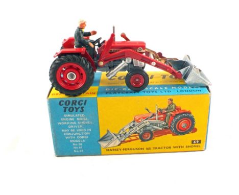 A boxed Corgi Toys 69 Massey Ferguson 165 tractor with shovel and driver