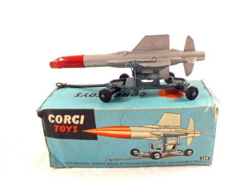 A boxed Corgi Toys 350 'Thunderbird' guided missile by English Electric Co, on assembly trolley, silver missile