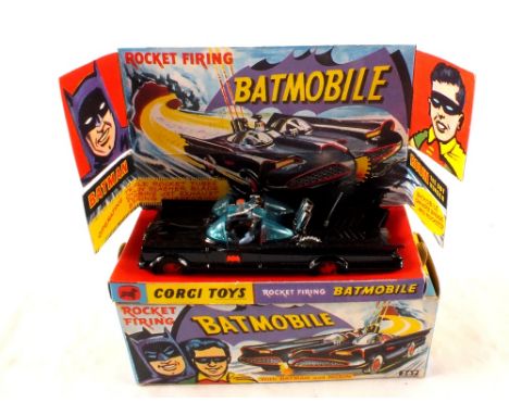 A boxed Corgi 267 Batmobile, red wheels in card box (no rockets)
