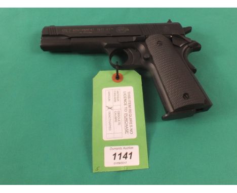A Colt Government 1911 A1 .177 C02 air pistol by Umarex within its original case with accessories, in overall excellent condi