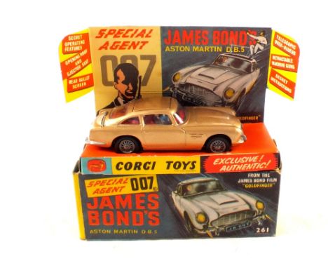 A boxed Corgi 261 James Bond Aston Martin DB5, with all required items