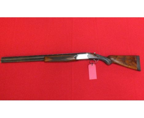 A 12 bore O/U ejector shotgun by Webley and Scott, 26 1/2" barrels with good bores, overall in good clean condition, S/No.300