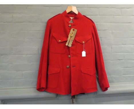 A late 19th Century Officers Home Service jacket and trousers with brass button protector