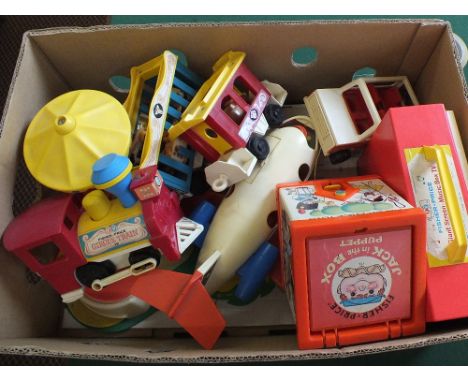 A large quantity of Fisher Price items including garage, record player, ferris wheel etc