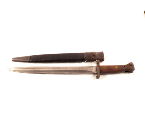 A 1888 model Le-metford bayonet with scabbard, blade marked and dated 7/02