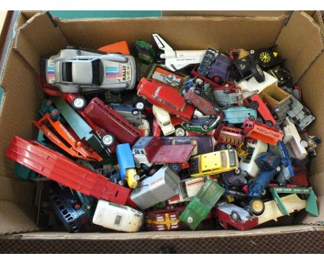 A large quantity of die cast and other models, Dinky, Corgi etc plus a box of costume dolls