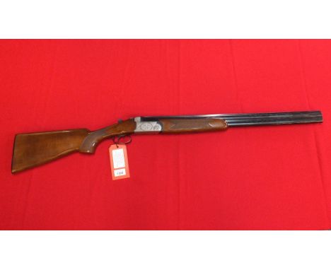 A 12 bore O/U shotgun by Antonio Zoli with 26” barrels, S/No.139857, in overall good condition, this item can only be purchas