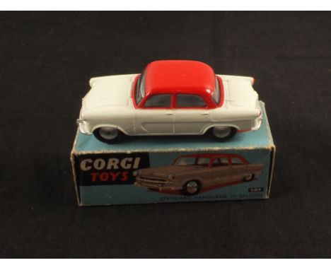 A boxed Corgi Toys 207 standard Vanguard III saloon, in light green and red