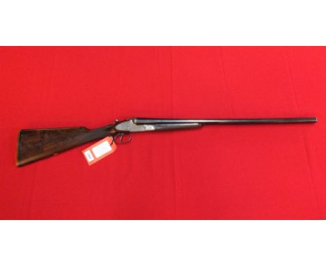 A 12 bore S/S shotgun by 'Bernardelli', 26 3/4" barrels with good clean bores, heavily engraved action with auto safety featu