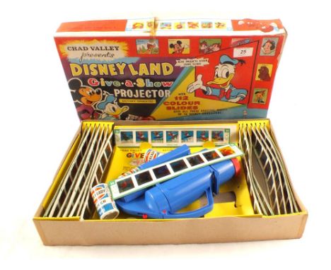 A boxed Chad Valley Disneyland Give-a-Show projector and slides