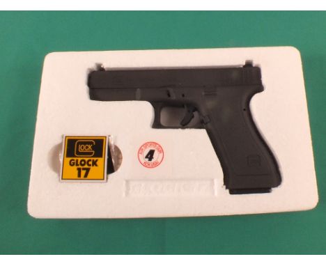 A Tanfolio 1911 C02 .177 air pistol with a 'soft air' Glock 17 pistol, both boxed, as a post 1939 air weapon the restrictions